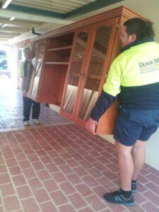 QuickMove Movers in Sydney Carrying Furniture To Truck